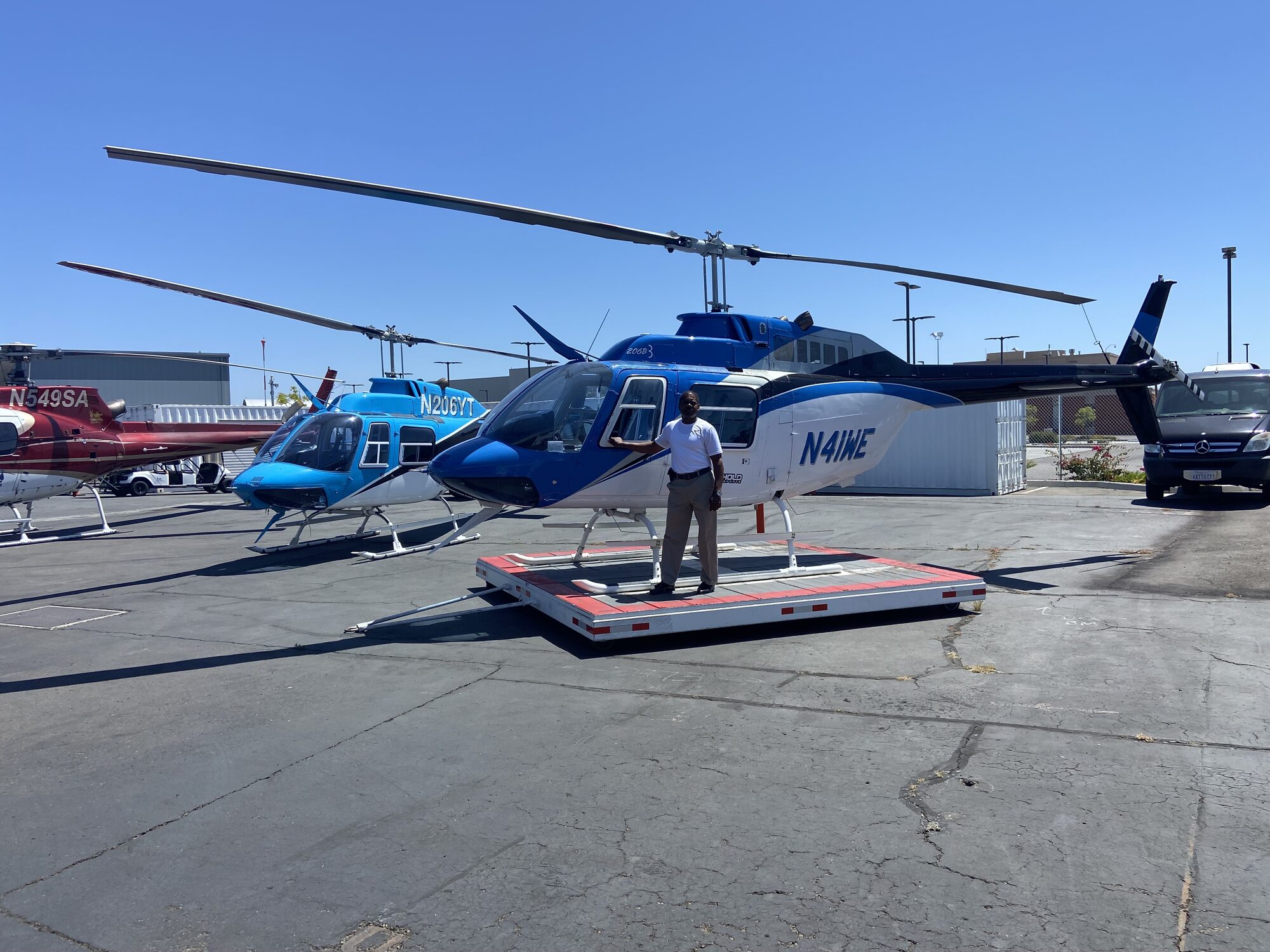 R.C. Anderson, ClearFlight Detailing founder, on the helicopter ramp with Bell helicopters